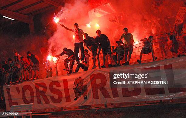 Ajaccio's fans jubilate after winning the French L2 football match Aaccio vs Metz on May 22 at the François Coty's stadium in Ajaccio. Ajaccio won...