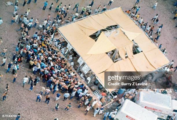 Aerial view of a food tent crowded with concert-goers at the Woodstock Music and Arts Fair in Bethel, New York, August 15 - 17 , 1969.