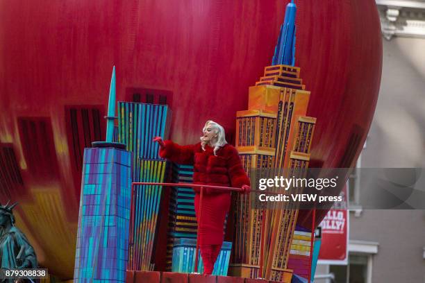 Bebe Rexha waves the people during the 91st annual Macy's Thanksgiving Day Parade on November 23, 2017 in New York City.