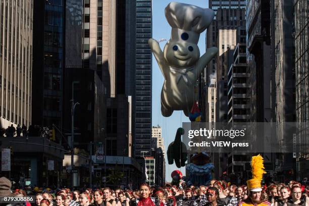 Balloons float over Sixth Avenue during the 91st annual Macy's Thanksgiving Day Parade on November 23, 2017 in New York City.