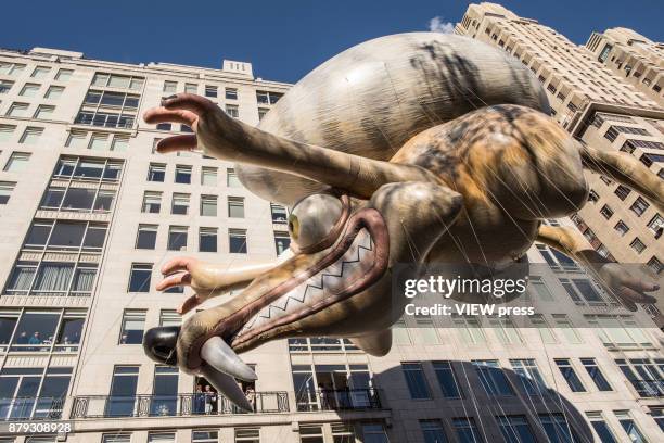 Ice Age's Scra floats over Central Park West during the 91st annual Macy's Thanksgiving Day Parade on November 23, 2017 in New York City.