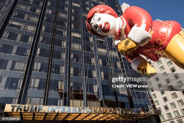 Ronald McDonald balloon floats near to Tump International Hotel at Central Park West during the 91st annual Macy's Thanksgiving Day Parade on...