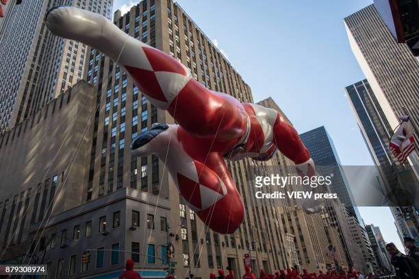 Red Mighty Morphin balloon floats over Sixth Avenue during the 91st annual Macy's Thanksgiving Day Parade on November 23, 2017 in New York City.