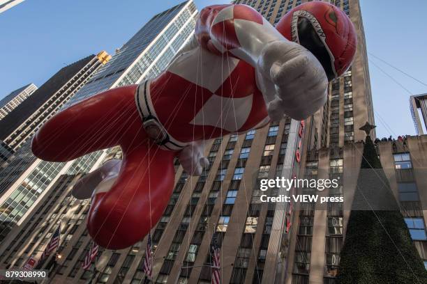 Red Mighty Morphin balloon floats over Sixth Avenue during the 91st annual Macy's Thanksgiving Day Parade on November 23, 2017 in New York City.