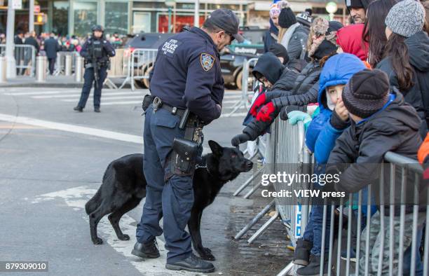 Officers patrol the street during the 91st annual Macy's Thanksgiving Day Parade on November 23, 2017 in New York City.