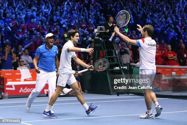 Captain of France Yannick Noah, Pierre-Hughes Herbert and Richard Gasquet of France celebrate winning the doubles match during day 2 of the Davis Cup...