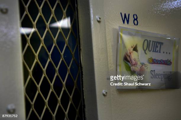 Quiet babies sleeping" sign hangings outside a prison cell on March 24, 2009 in Indianapolis, Indiana. Indiana Women's Prison is host to the Family...