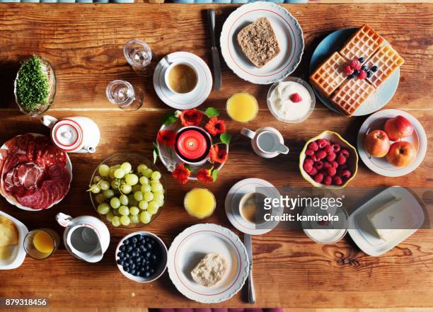 breakfast table – overhead view - saturday stock pictures, royalty-free photos & images