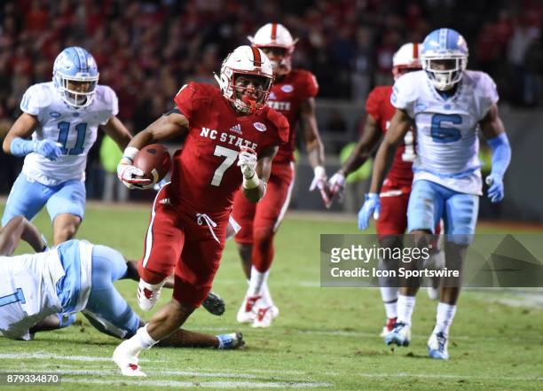 North Carolina State Wolfpack running back Nyheim Hines breaks a 50 yard touchdown run during the game between the North Carolina Tarheels and the NC...