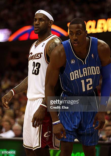 LeBron James of the Cleveland Cavaliers and Dwight Howard of the Orlando Magic get in position for a free throw in Game Two of the Eastern Conference...