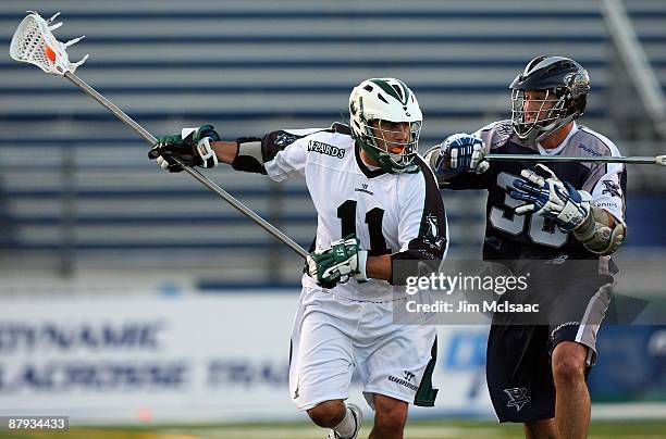 John Gagliardi of the Long Island Lizards controls the ball against the Washington Bayhawks during their Major League Lacrosse game on May 21, 2009...