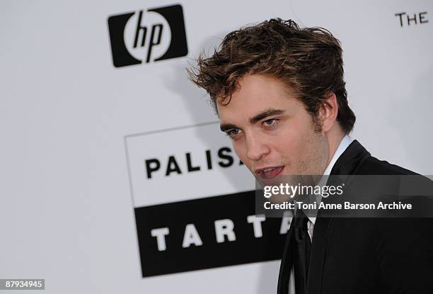 Actor Robert Pattinson attends the amfAR Cinema Against AIDS 2009 benefit at the Hotel du Cap during the 62nd Annual Cannes Film Festival on May 21,...