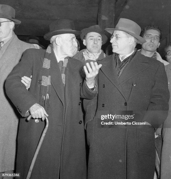 Palmiro Togliatti talking to a man at 'Termini train station', Rome 1948.