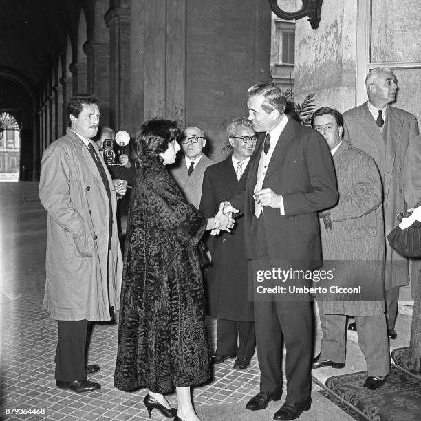Actress Anna Magnani at the Quirinal Palace with Pietro Germi, Cesare Zavattini, Domenico Meccoli, John Huston and Guidarino Guidi, Rome 1957.