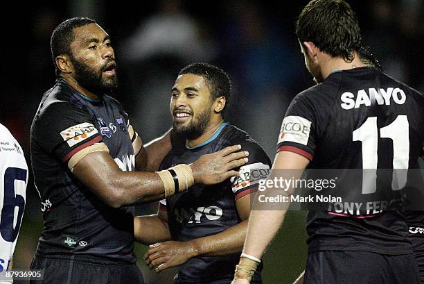 Michael Jennings of the Panthers is congratulated after scoring a try during the round 11 NRL match between the Penrith Panthers and the Sydney...