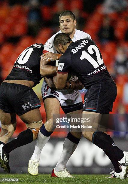 Willie Mason of the Roosters is tackled during the round 11 NRL match between the Penrith Panthers and the Sydney Roosters at CUA Stadium on May 23,...