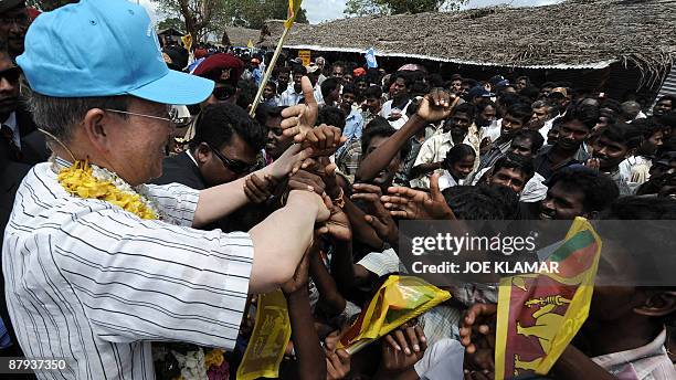 Secretary-General Ban Ki-moon is greeted by IDPs as he visits Manik Farm in Sri Lanka on May 23, 2009. Just days after Colombo declared victory over...