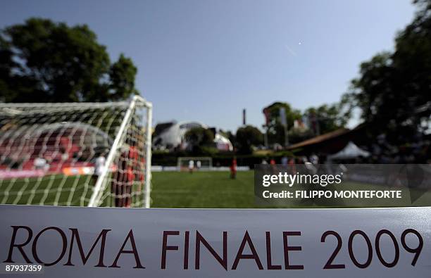 Children play football on a pitch setup at the Champions Village in Rome's Colle Oppio on May 23, 2009. The Champions League cup will be exhibited at...