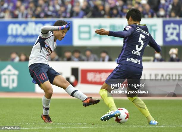 Tokyo's Takefusa Kubo shoots during his J-League first division debut on Nov. 26 against Sanfrecce Hiroshima. The 16-year-old former Barcelona...