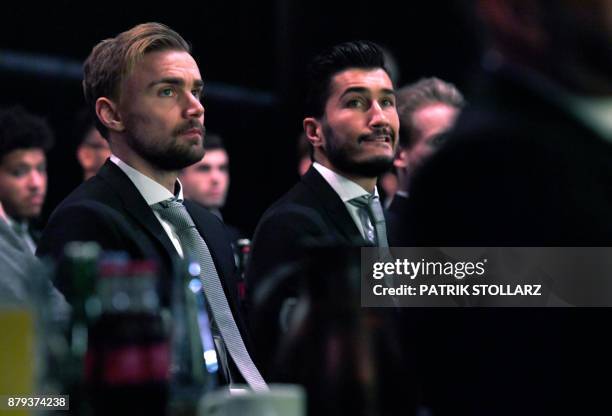 Dortmund's defender Marcel Schmelzer and midfielder Nuri Sahin attend the annual general meeting of German first division Bundesliga football club...