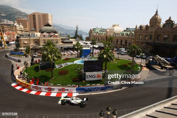Jenson Button of Great Britain and Brawn GP drives through Casino Square during the final practice session prior to qualifying for the Monaco Formula...