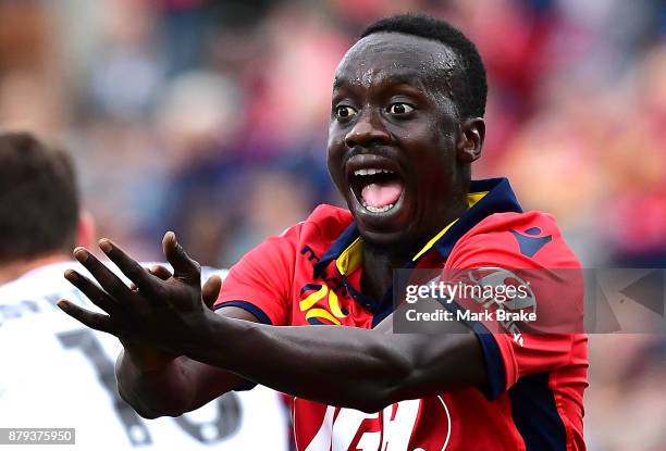 Papa Babacar Diawara of Adelaide United calls for a handball later given by video referall resulting in a penalty during the round eight A-League...