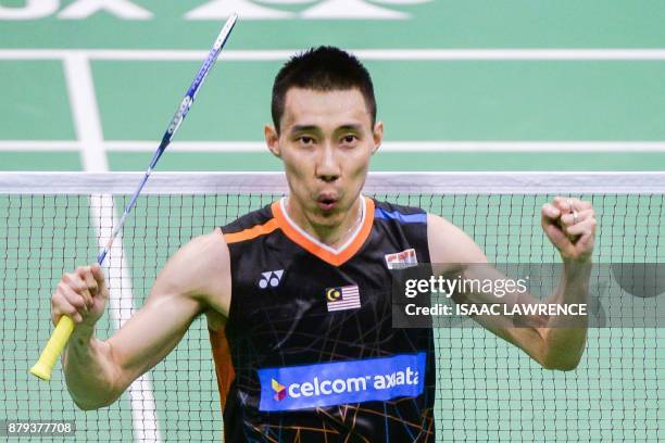 Malaysia's Lee Chong Wei reacts after winning the men's singles final against China's Chen Long at the Hong Kong Open badminton tournament in Hong...