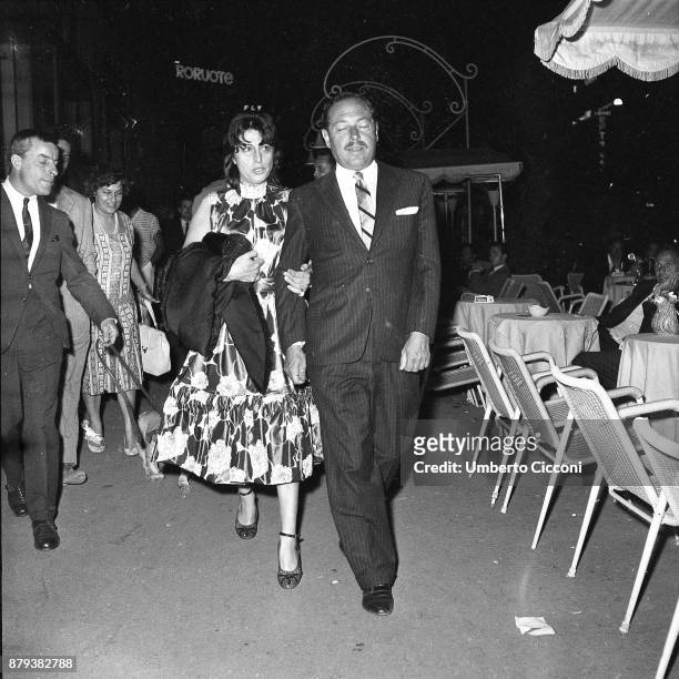 Italian actress Anna Magnani walks with American playwright Tennessee Williams, Rome 1958.