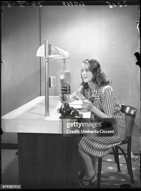 Italian actress Alida Valli speaks at the radio in 1942.