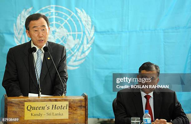 United Nations Secretary General Ban Ki-moon delivers his speech while Sri Lankan Minister of Foreign Affairs Rohitha Bogollagama looks on during a...