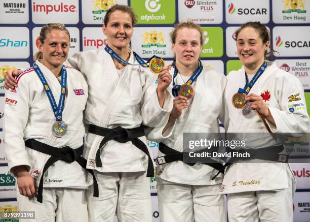 Under 63kg medallists L-R: Silver; Alice Schlesinger , Gold; Juul Franssen , Bronzes; Sanne Vermeer and Stefanie Tremblay during the The Hague Judo...
