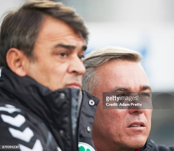 Damir Buric head coach of SpVgg Greuther Fuerth chats to Olaf Janssen head coach of FC St. Pauli during the Second Bundesliga match between SpVgg...