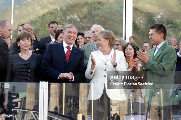 German President Horst Koehler and his wife Eva Luise Koehler and German Chancellor Angela Merkel and her husband Joachim Sauer attend the...