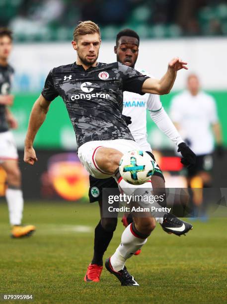 Lasse Sobiech of FC St. Pauli is challenged by Khaled Narey of SpVgg Greuther Fuerth during the Second Bundesliga match between SpVgg Greuther Fuerth...