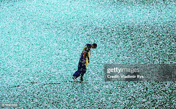 Edin Dzeko of Wolfsburg walks over the pitch after winning the German championship after their Bundesliga match against SV Werder Bremen at...