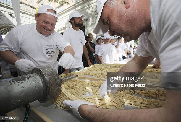 Pasta makers attempt to beat a new Guinness world record for the longest Spaghetti pasta on May 23, 2009 in Capezzano Pianore, central Italy. More...