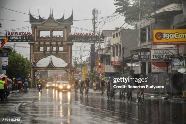 Cyclists compete pass through Jambatan Limpa Peh in heavy rain during stage 9 of the Tour de Singkarak 2017, Pasaman-Bukittinggi 117,2 km on November...