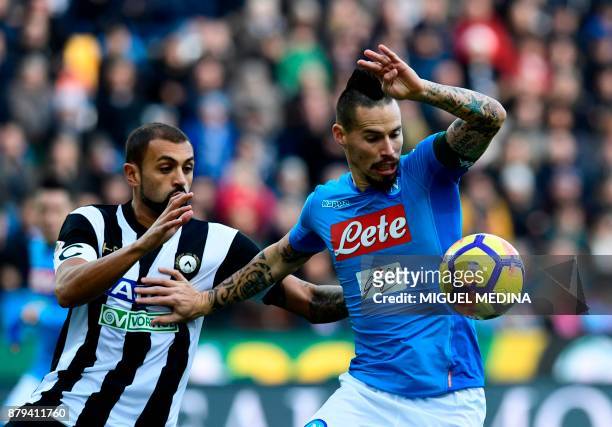 Napoli's Slovakian midfielder Marek Hamsik vies with Udinese's Brazilian defender Danilo Larangeira the Italian Serie A football match Udinese vs...