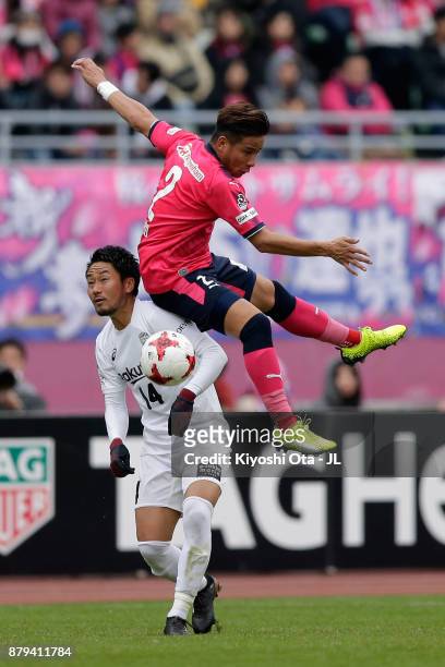 Riku Matsuda of Cerezo Osaka and Naoyuki Fujita of Vissel Kobe compete for the ball during the J.League J1 match between Cerezo Osaka and Vissel Kobe...
