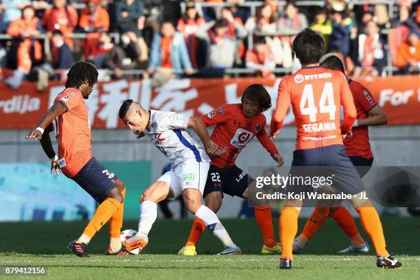 Dudu of Ventforet Kofu controls the ball under pressure of Omiya Ardija defense during the J.League J1 match between Omiya Ardija and Ventforet Kofu...