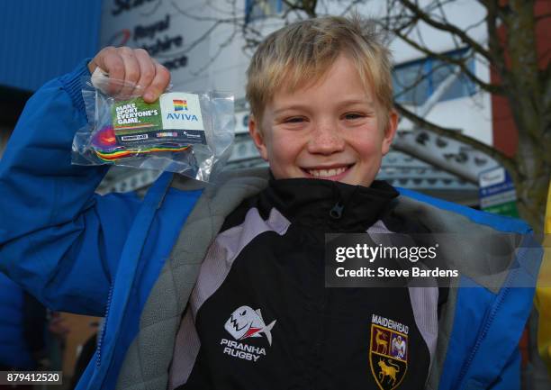 Supporters are given rainbow laces as part of the Rainbow Laces campaign run by LGBT charity Stonewall to promote LGBT inclusion in sport prior to...