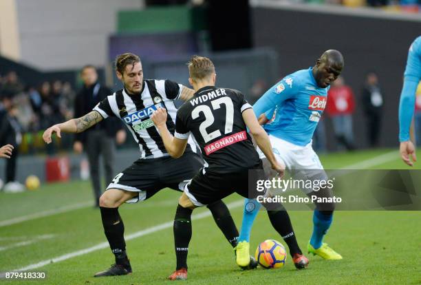 Gabriele Angella and Silvan Widmer of Udinese Calcio compete with Kalido Koulibaly of SSC Napoli during the Serie A match between Udinese Calcio and...