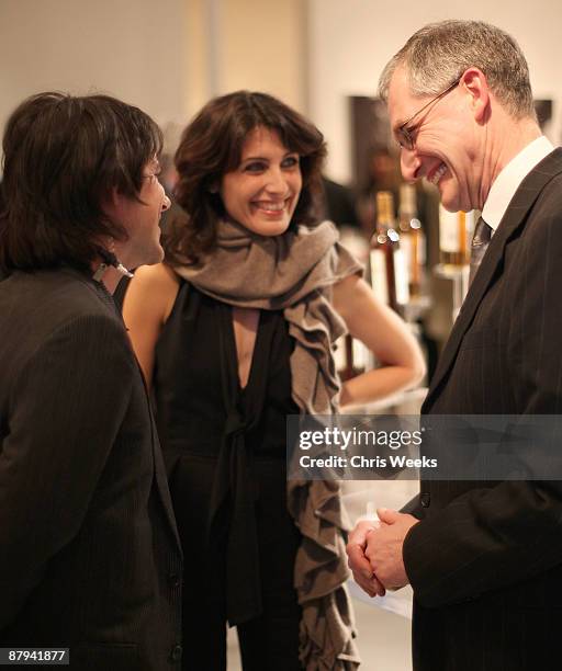 Bryan Rabin , actress Lisa Edelstein and Ken Grier attend The Macallan's "Master of Photography" series at M+B Gallery on January 29, 2008 in West...