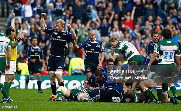 Leo Cullen of Leinster celebrates as Referee Nigel Owens blows the final whistle at the end of the Heineken Cup Final match between Leicester Tigers...