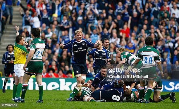 Leo Cullen of Leinster celebrates as Referee Nigel Owens blows the final whistle at the end of the Heineken Cup Final match between Leicester Tigers...