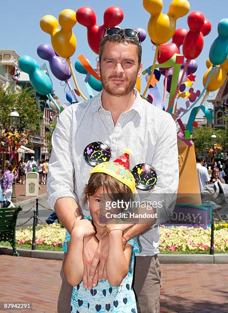 In this handout image provided by Disney "Brothesr and Sisters Star" Balthazer Getty celebrates his daughter Grace's seventh birthday with friends...