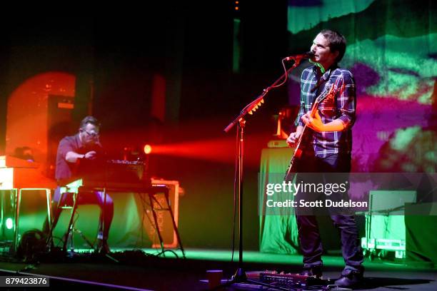 Musicians Joe Lester and Brian Aubert of the band Silversun Pickups perform onstage during a benefit concert in support of Unidos at The Theatre at...
