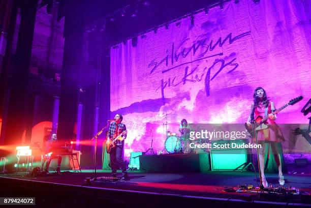 Musicians Joe Lester, Chris Guanlao, Brian Aubert and Nikki Monninger of the band Silversun Pickups perform onstage during a benefit concert in...