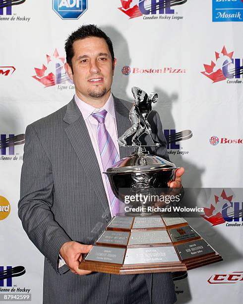 Bob Boughner Head Coach of the Windsor Spitfires poses for a photo with the CHL Coach of the Year Trophy during 2009 CHL Awards Gala at the...