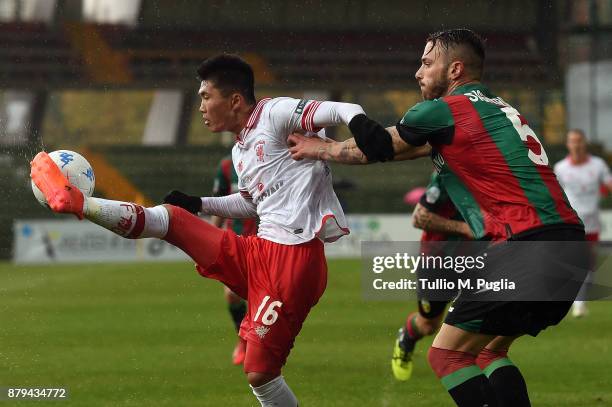 Kwang Song Han of Perugia controls the ball as Andrea Signorini of Ternana tackles during the Serie A match between Ternana Calcio and AC Perugia at...